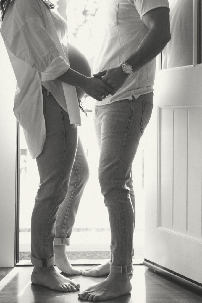  Intimate at-home maternity session with cozy setting and emotional storytelling