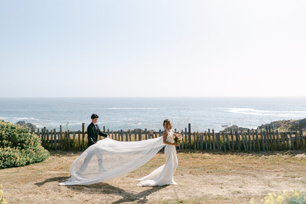 Couple walking along Sea Ranch Cliff
