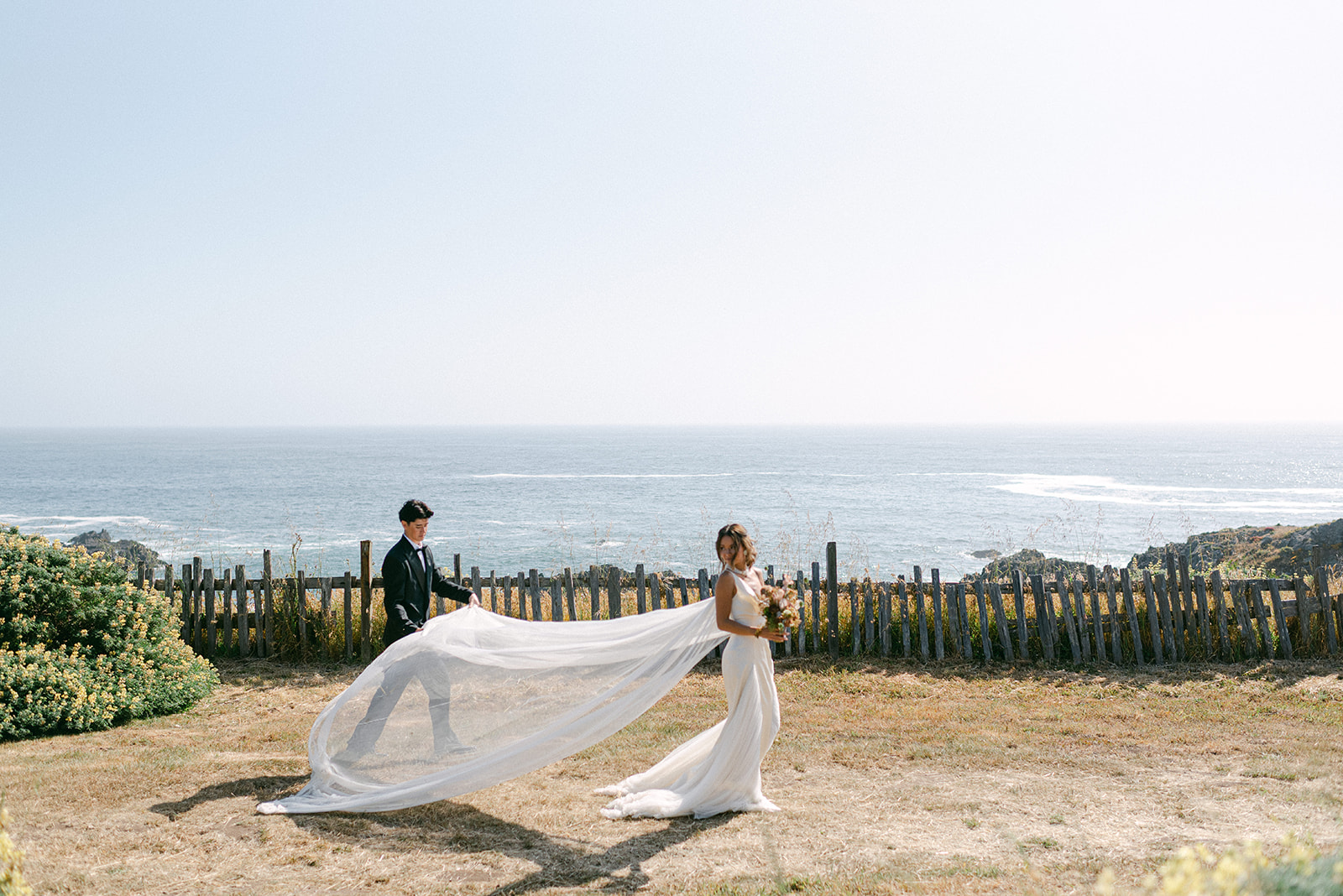 Couple walking along Sea Ranch Cliff